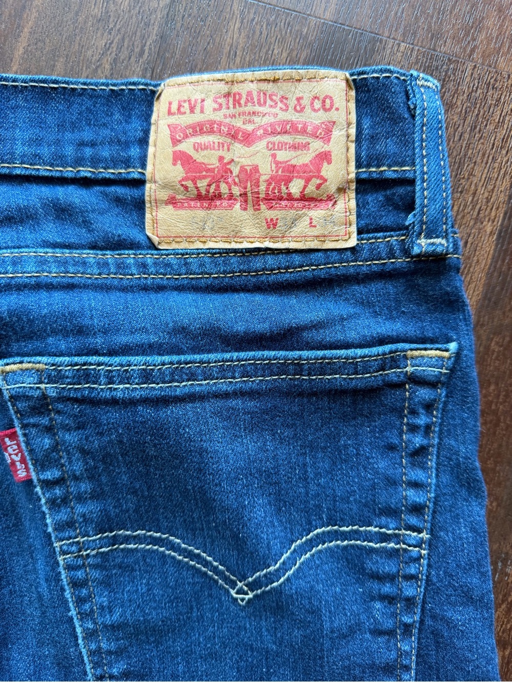 Levi's Men's Straight Jeans in Dark Blue with Brown Patch